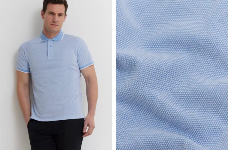 mezczyzna w błękitnej koszulce polo, na białym tle, zbliżenie na materiał